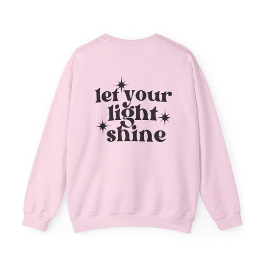 A unisex heavy blend crewneck sweatshirt, Let Your Light Shine Crew, offers pure comfort with ribbed knit collar, no itchy seams, and a loose fit. Made of 50% cotton and 50% polyester. Medium-heavy fabric.