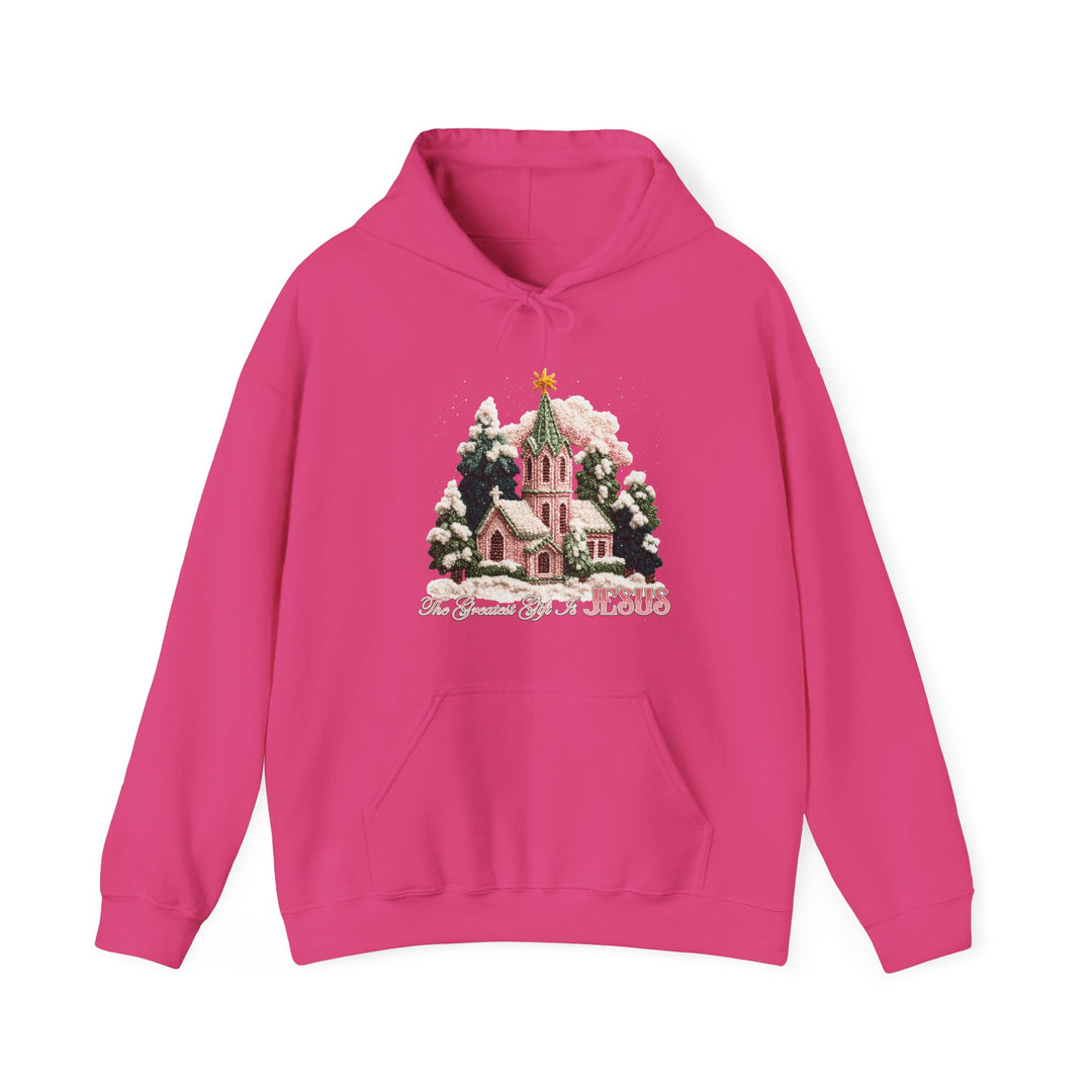 Bright pink hoodie with church scene and The Greatest Gift is JESUS text, featuring a drawstring hood and kangaroo pocket, from Faith Family Designs.