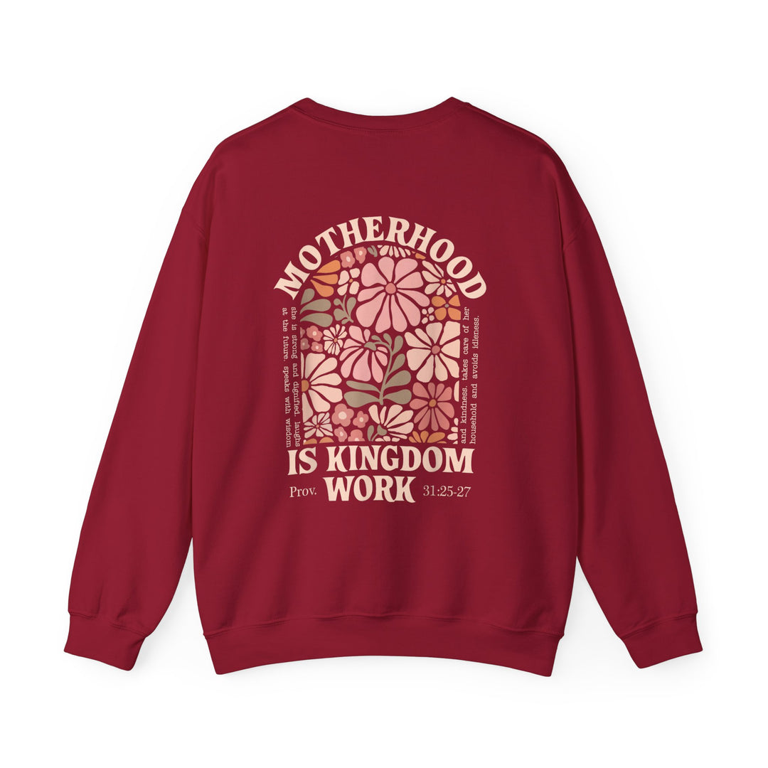 Motherhood Kingdom Work Crew: Red crew-neck sweatshirt featuring floral arch and Proverbs 31 quotes, ideal for comfort with a blend of cotton and polyester.