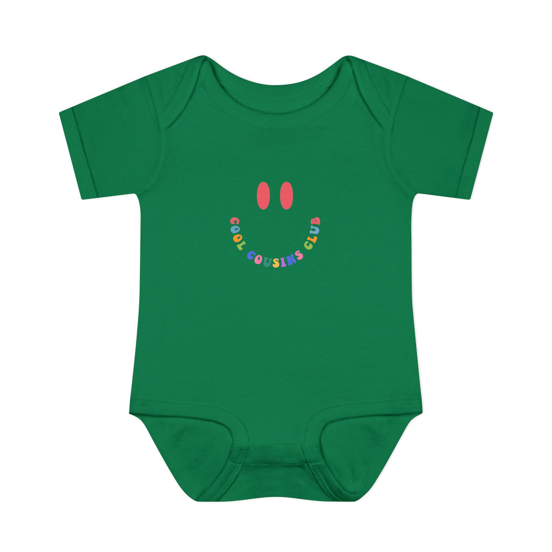 Infant unisex Cool Cousins Club onesie made from soft ring-spun cotton, featuring lap shoulders for easy dressing, ideal for comfort and mobility.