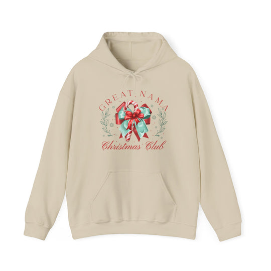 Great Nama Christmas Club Hoodie with festive candy cane graphic, greenery, and snowflakes on light-beige fabric, featuring a kangaroo pocket and drawstring hood.