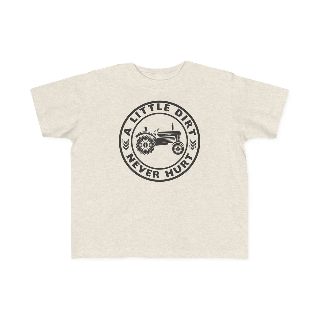 A Little Dirt Never Hurt Toddler Tee featuring a black circular graphic with a tractor and wheat icons, designed for comfort with soft cotton fabric.