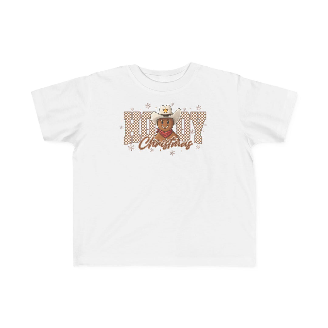 Howdy Christmas Toddler Tee featuring a cartoon gingerbread cookie with cowboy hat and bandana, surrounded by festive text and snowflakes, perfect for sensitive skin.