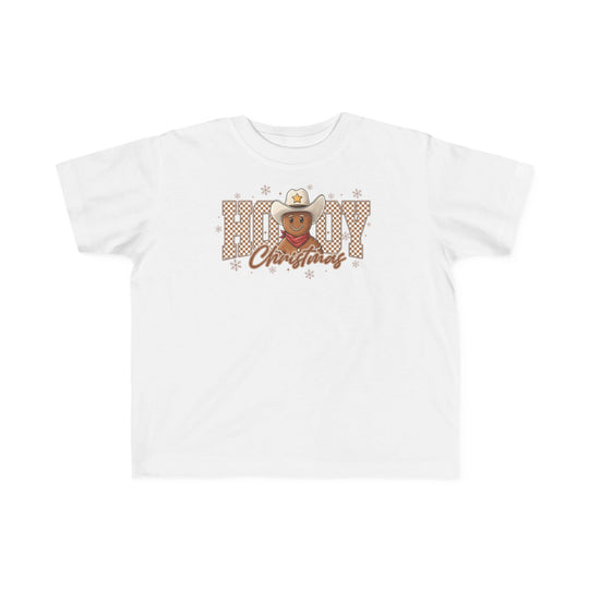 Howdy Christmas Toddler Tee featuring a cartoon gingerbread cookie with cowboy hat and bandana, surrounded by festive text and snowflakes, perfect for sensitive skin.