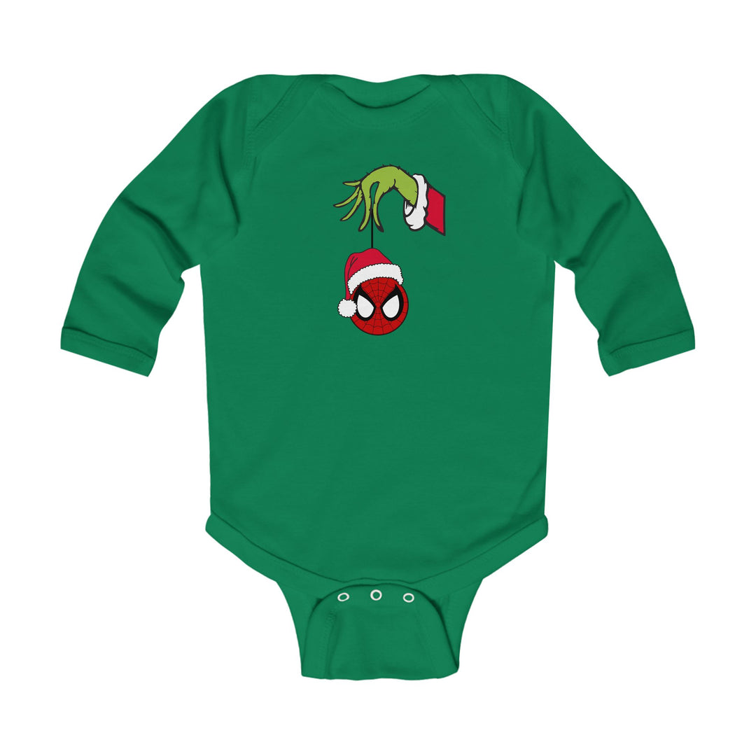 Spider Ball Christmas Onesie: A green baby onesie featuring a Grinch-like hand holding a Spider-Man ornament with a Santa hat, designed for comfort and easy changing.