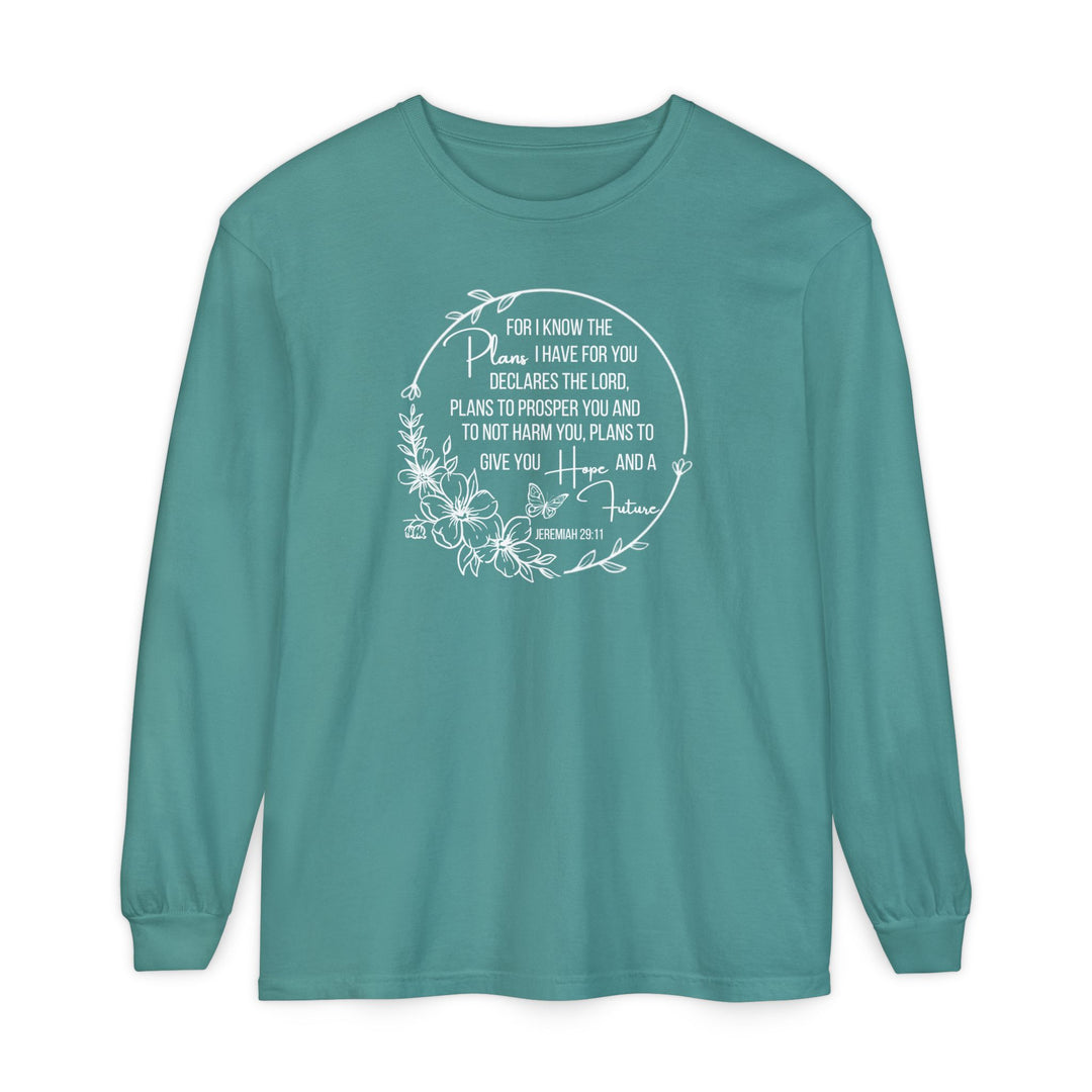 Teal long-sleeve tee featuring Jeremiah 29:11 in white floral wreath design, offering soft, relaxed fit. Made from 100% ring-spun cotton.