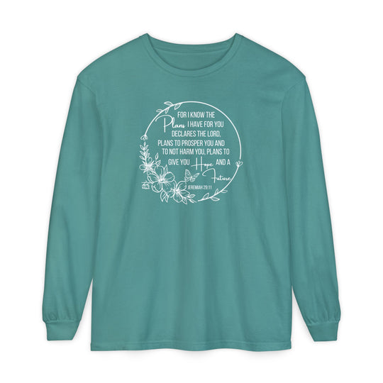 Teal long-sleeve tee featuring Jeremiah 29:11 in white floral wreath design, offering soft, relaxed fit. Made from 100% ring-spun cotton.