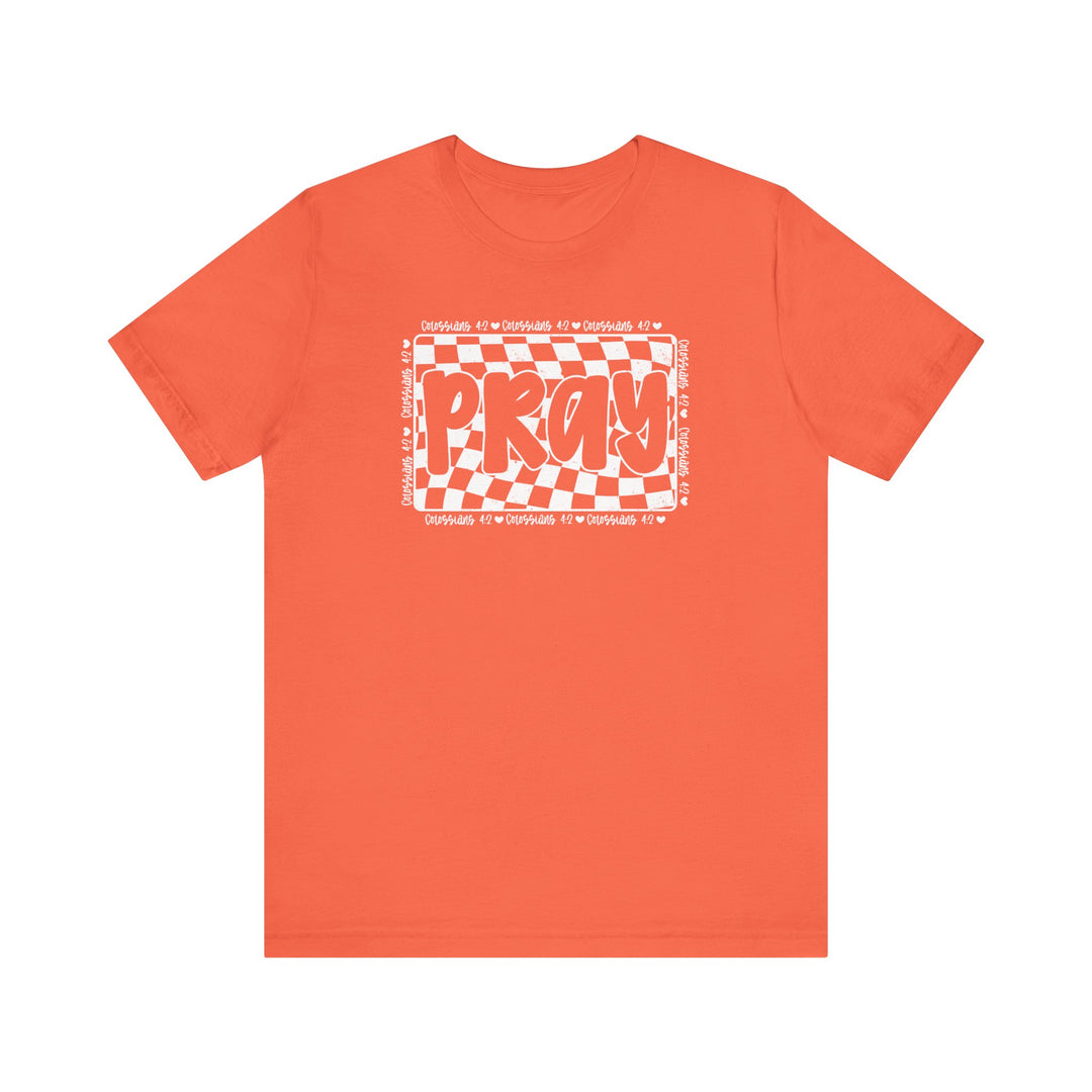 Pray Tee: Red t-shirt featuring bold white text, crafted from soft cotton for a comfortable fit, with ribbed knit collars and dual side seams. Unisex design.