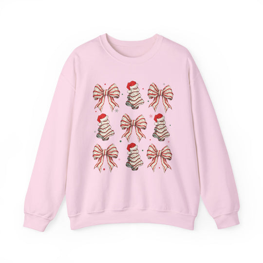 Cookies and Bows Crew: Light-pink crewneck sweatshirt featuring a festive grid of candy-stripe bows and Christmas trees with Santa hats. Cozy, durable, and perfect for holiday cheer.