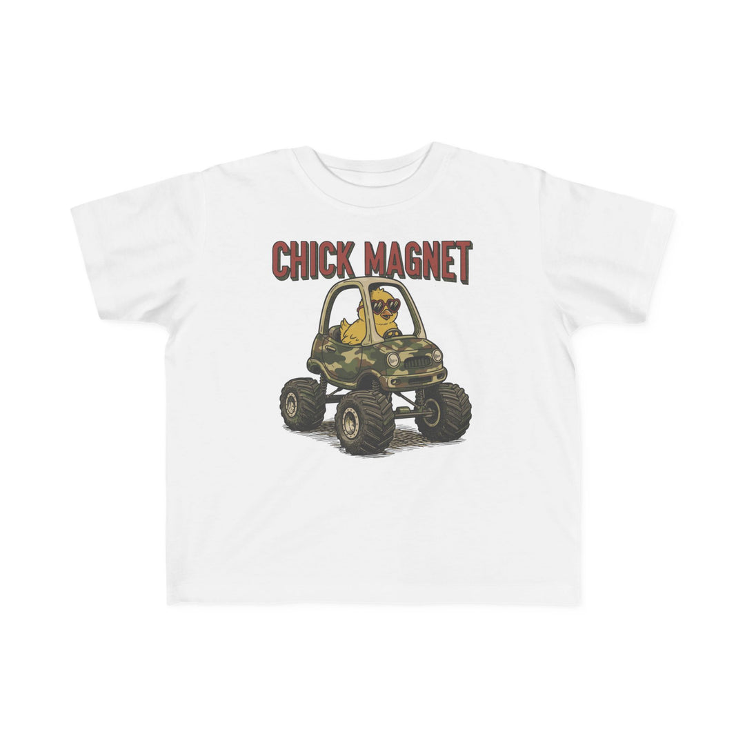 Chick Magnet Toddler Tee featuring a yellow chick in heart sunglasses driving a monster truck, ideal for toddlers with its soft, durable cotton fabric.