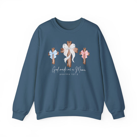 Blue sweatshirt with three wooden crosses, each with bows, and God Made Me a Mama script; perfect blend of comfort and style from Faith Family Designs.