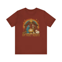 Oh Holy Night Tee with embroidered Nativity scene featuring Mary, Joseph, baby Jesus, animals, and star. Crafted from soft cotton, it offers comfort and durability.