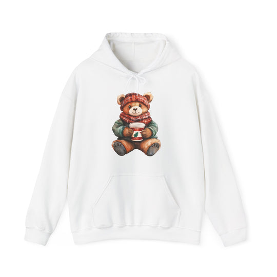 Old Money Bear Hoodie features a teddy bear in a plaid hat and scarf, holding a festive drink, on a cozy white sweatshirt.