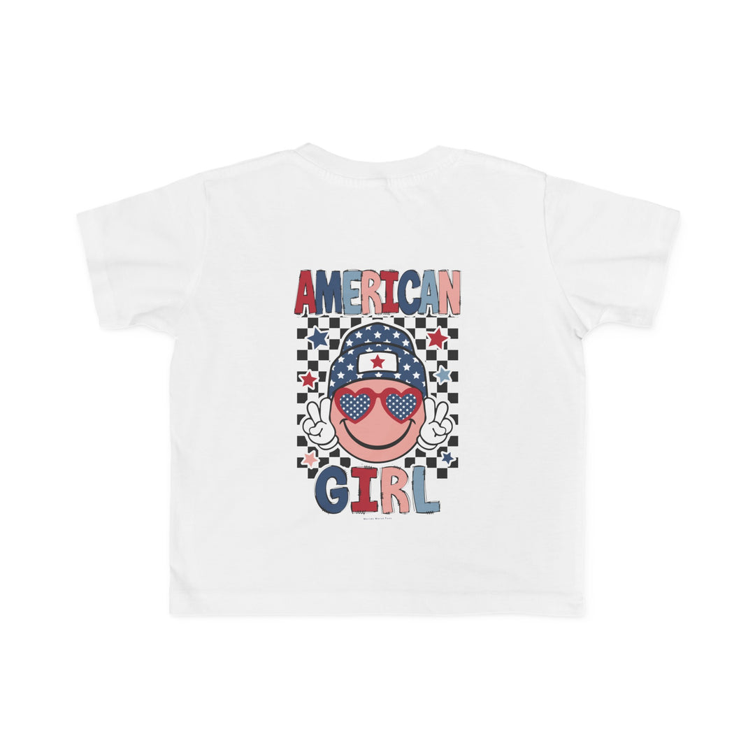 American Girl Toddler Tee featuring a cartoon face with sunglasses and a hat, perfect for sensitive skin. 100% combed ringspun cotton, light fabric, tear-away label, classic fit. Available in sizes 2T to 5-6T.