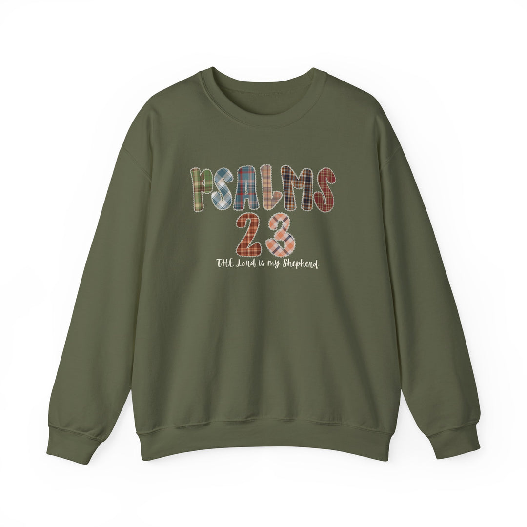 Psalms 23 Hoodie: Olive-green crewneck with PSALMS 23 in patchwork letters, smaller script The Lord is my Shepherd beneath. Cozy, durable, cotton-polyester blend.