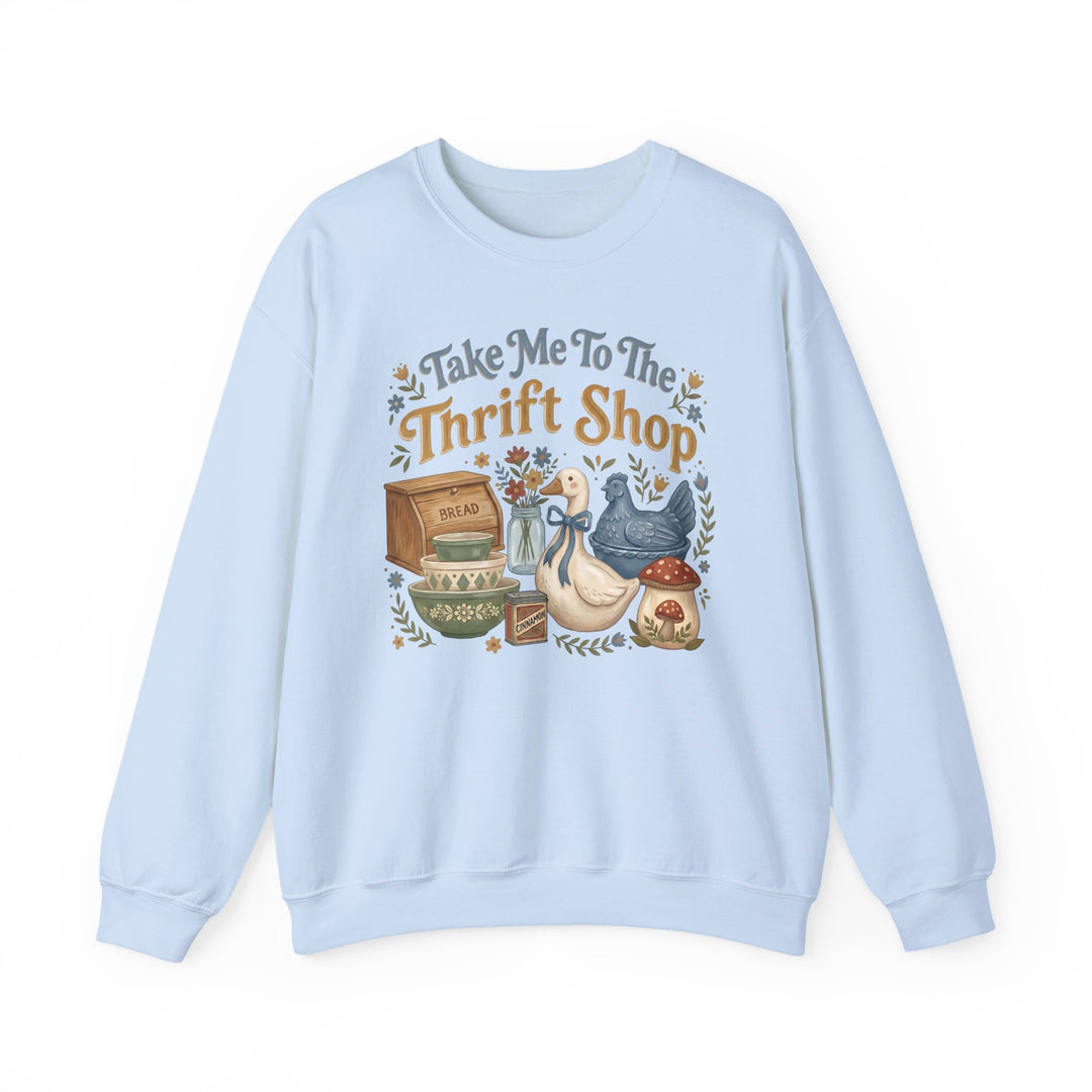 Take Me to the Thrift Shop Crew sweatshirt featuring a cozy vintage thrift-shop collage with bread box, bowls, cinnamon tin, wildflowers, and whimsical figurines.