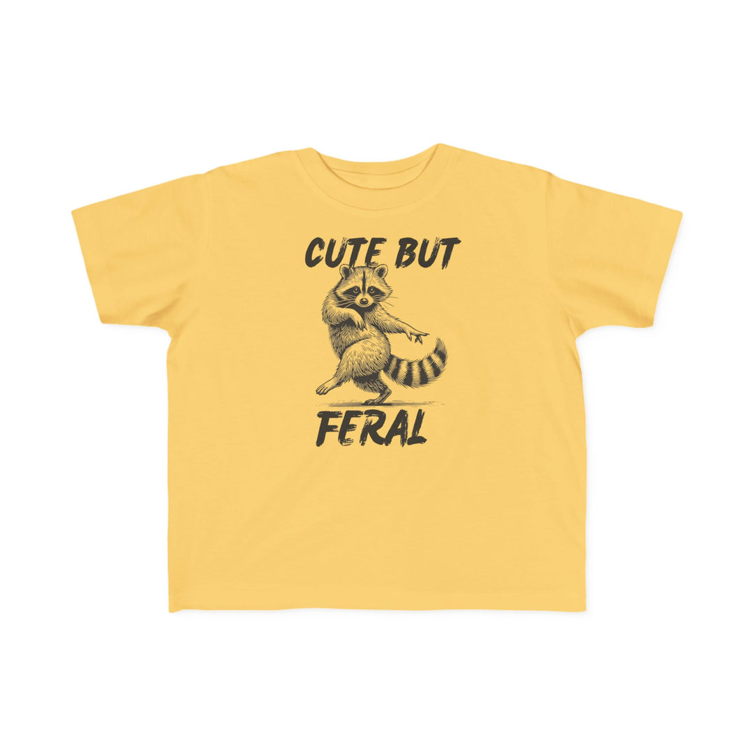 Cute but Feral Toddler Tee featuring a dancing raccoon illustration and slogan, perfect for sensitive skin with durable, high-quality print.