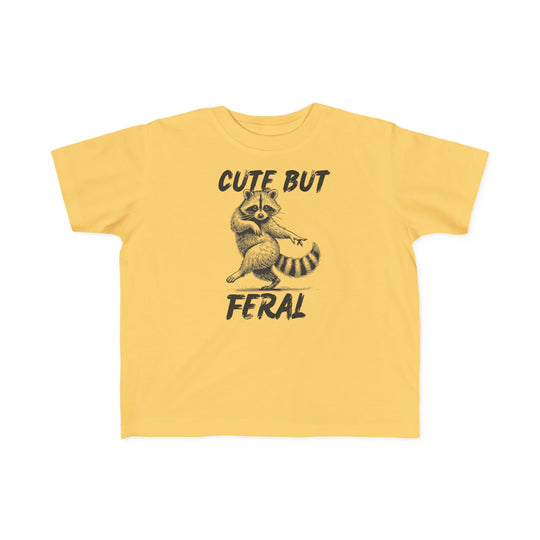 Cute but Feral Toddler Tee featuring a dancing raccoon illustration and slogan, perfect for sensitive skin with durable, high-quality print.