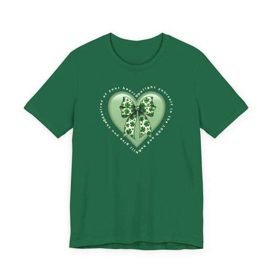 Forest-green Delight in the LORD Tee features a glossy heart with a clover-patterned bow and an inspirational scripture encircling it, offering comfort and style.