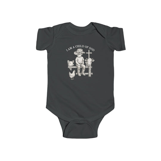 Child of God Onesie featuring a child in a cowboy hat on a fence with farm animals and a cross, emphasizing comfort with durable cotton fabric.