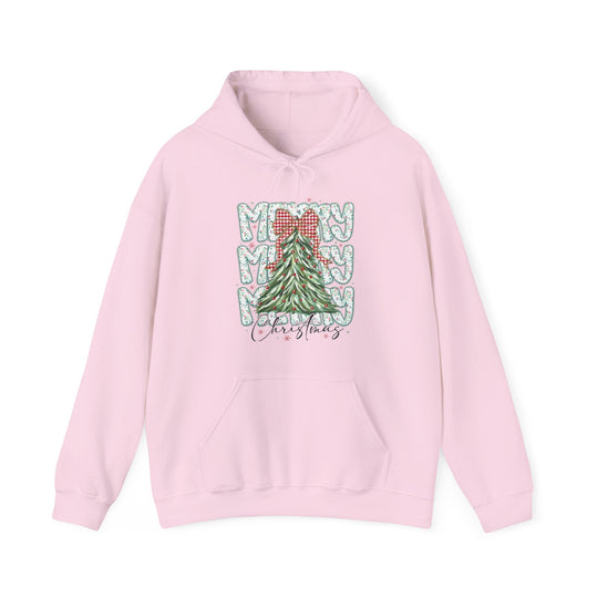 Merry Christmas Hoodie featuring a festive tree graphic with red baubles and gingham bow, mint-green MERRY text, and kangaroo pocket on light pink fabric.