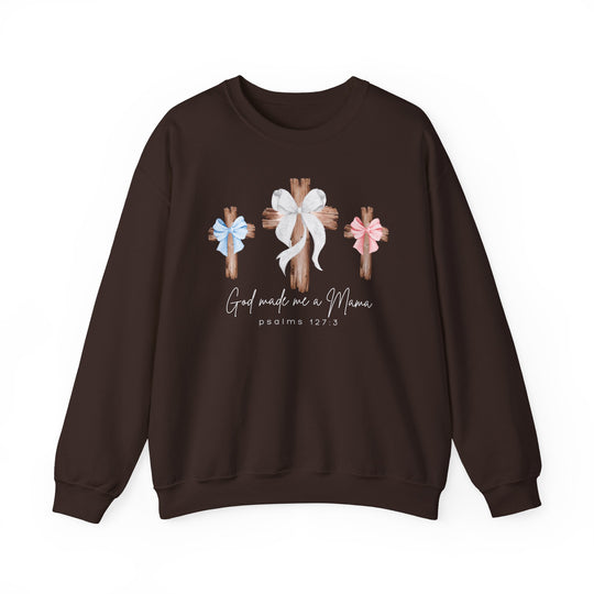 Dark-brown crewneck sweatshirt with three wooden crosses, bows, and 'God made me a Mama' design; cozy polyester-cotton blend by Faith Family Designs.