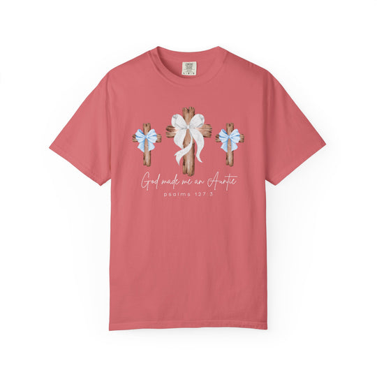 God Made Me an Auntie Tee features three wooden crosses with bows, script text, and a Bible verse, on a coral-pink Comfort Colors t-shirt.