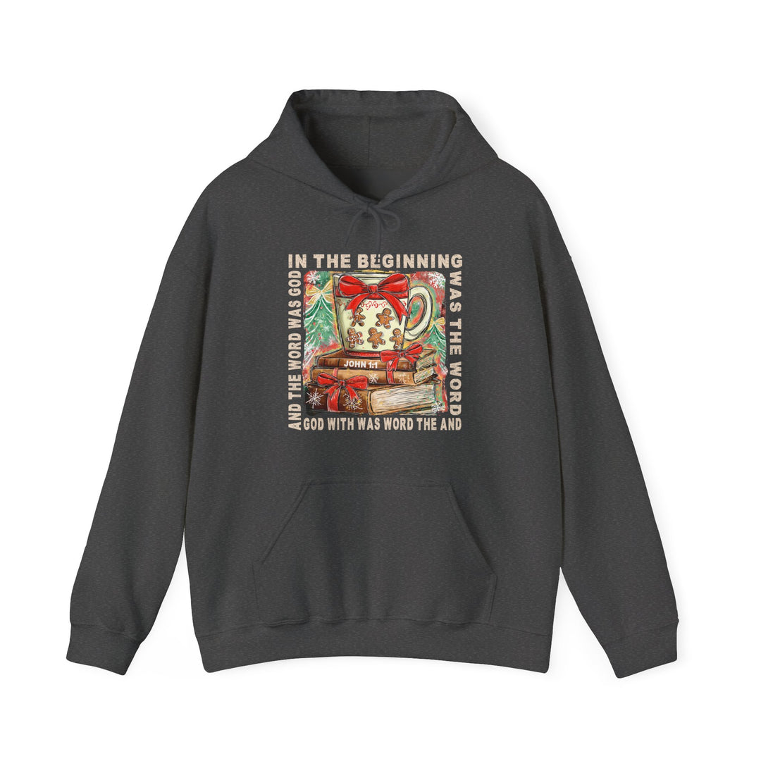 Dark-charcoal hoodie featuring a Christmas-themed graphic with a Bible verse from John 1:1, showcasing books and a festive mug, by Faith Family Designs.