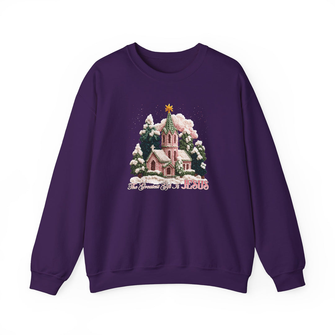 Gift is Jesus Crew sweatshirt displaying a winter church scene with fir trees and golden star, highlighting The Greatest Gift Is JESUS in stylized lettering.