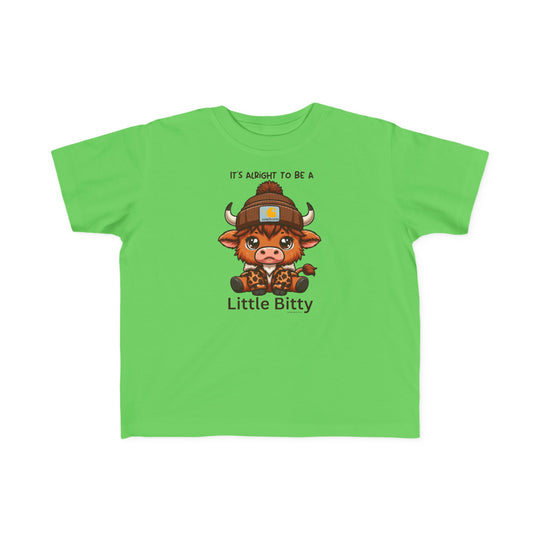 A Little Bitty Toddler Tee featuring a cartoon cow print on a green shirt. Made of soft 100% combed ringspun cotton, light fabric, tear-away label, and a classic fit. Sizes available: 2T, 3T, 4T, 5-6T.