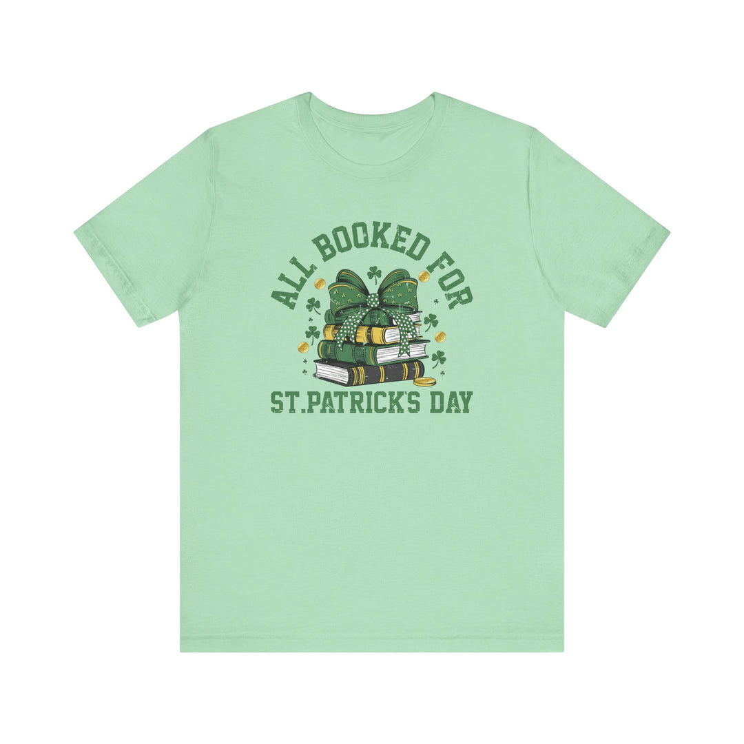 Booked for St. Patrick's Day Tee featuring a green graphic design on a soft, unisex short sleeve t-shirt, perfect for festive occasions.