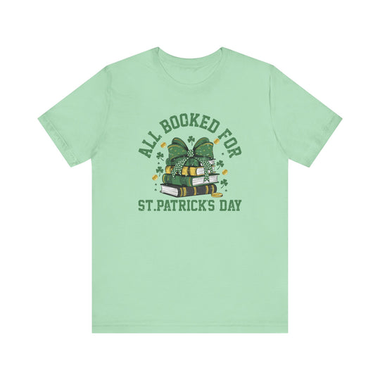 Booked for St. Patrick's Day Tee featuring a green graphic design on a soft, unisex short sleeve t-shirt, perfect for festive occasions.