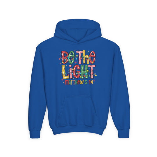 Be the Light Youth Hoodie with festive graphic and Bible verse, features ultra-soft fleece, kangaroo pocket, regular fit; perfect for the holiday season.