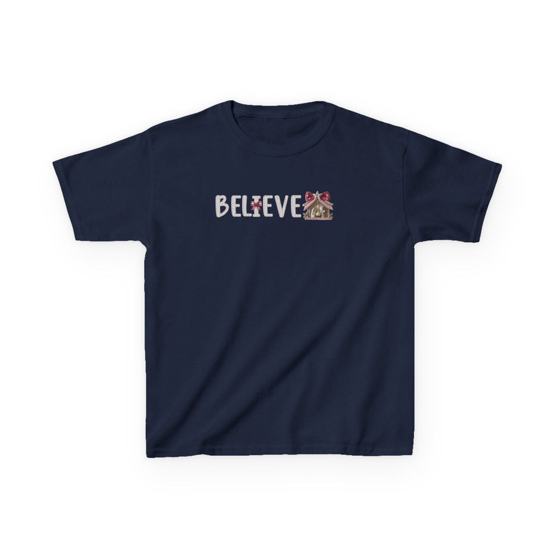 Navy blue Believe Kids Tee featuring BELIEVE text with a cross replacing the I and a nativity-style stable design, ideal for everyday wear.
