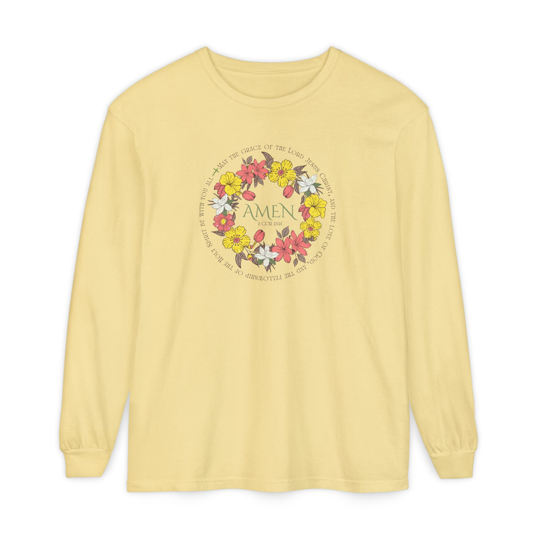 Amen Long Sleeve Tee featuring a floral wreath with “AMEN” and 2 Cor 13:14 verse, crafted from soft 100% ring-spun cotton for a relaxed fit.