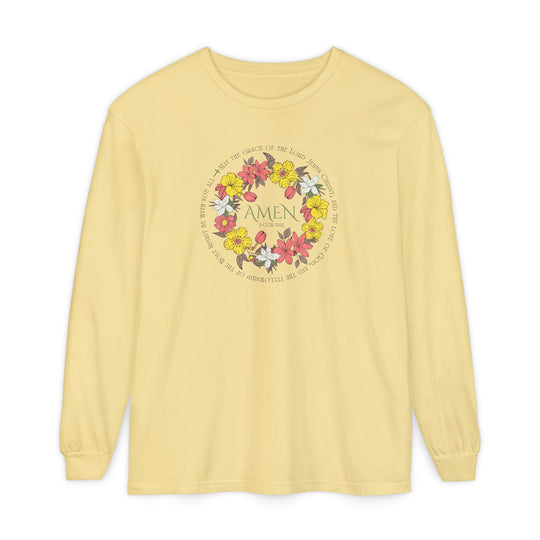 Amen Long Sleeve Tee featuring a floral wreath with “AMEN” and 2 Cor 13:14 verse, crafted from soft 100% ring-spun cotton for a relaxed fit.