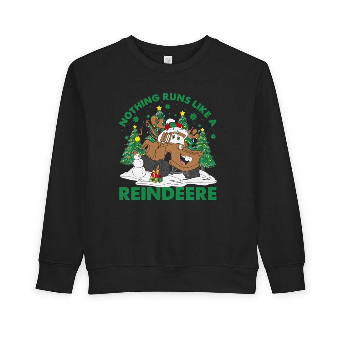Reindeere Toddler Crew: Black sweatshirt featuring a festive reindeer-truck graphic with snowman, gift, snowy trees, and Nothing runs like a REINDEERE slogan. Cozy fleece blend.