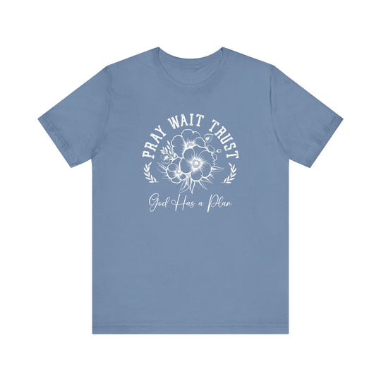 Pray Wait Trust Tee: Blue t-shirt featuring white text, classic unisex jersey short sleeve, soft cotton, ribbed knit collars, and dual side seams for durability.