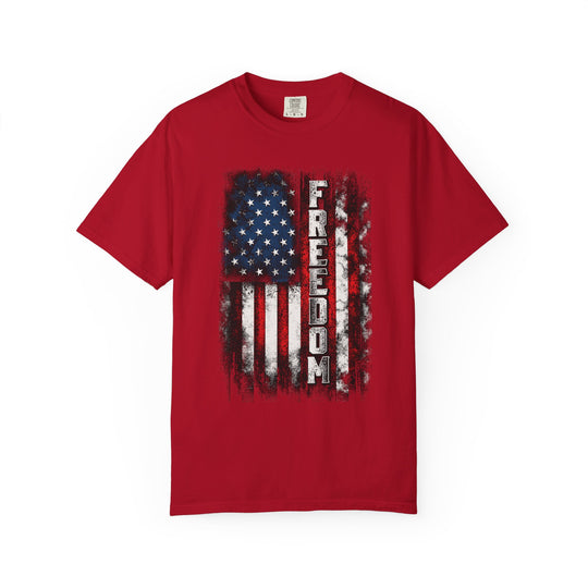 Red Comfort Colors Freedom Tee with distressed U.S. flag graphic and vertically stacked FREEDOM letters, offering a relaxed fit and soft-washed feel.