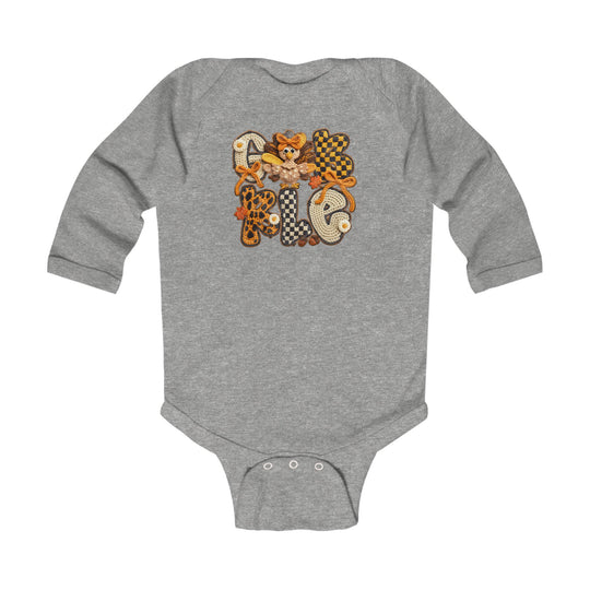 Heather-gray Gobble onesie with playful patchwork graphic, turkey motif, and autumnal accents. Long sleeves and snap closures for easy changing, ideal for babies.