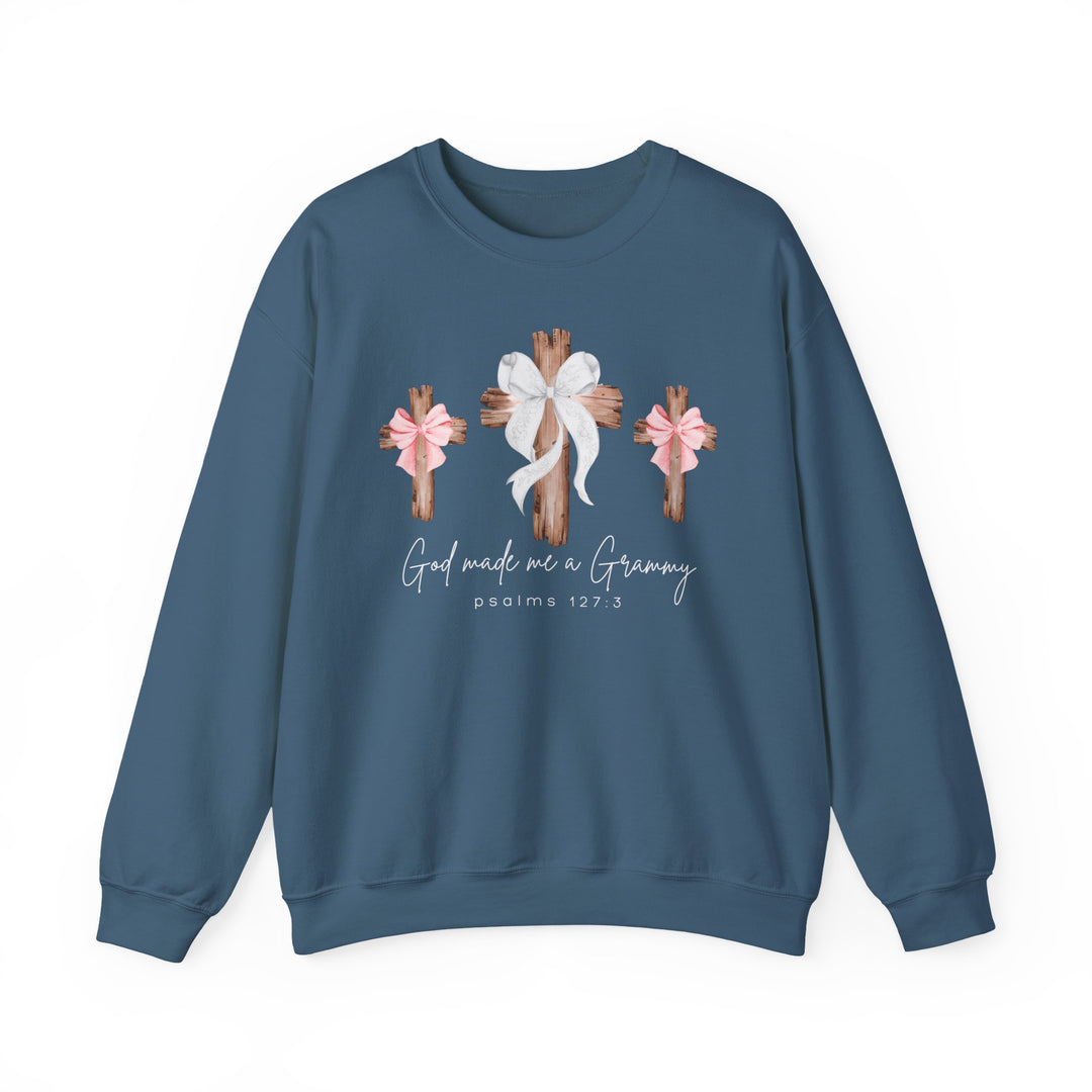 God Made Me a Grammy Crew: Slate-blue sweatshirt with three wooden crosses, central cross with white bow, pink bows on sides, and Psalm 127:3 text below.