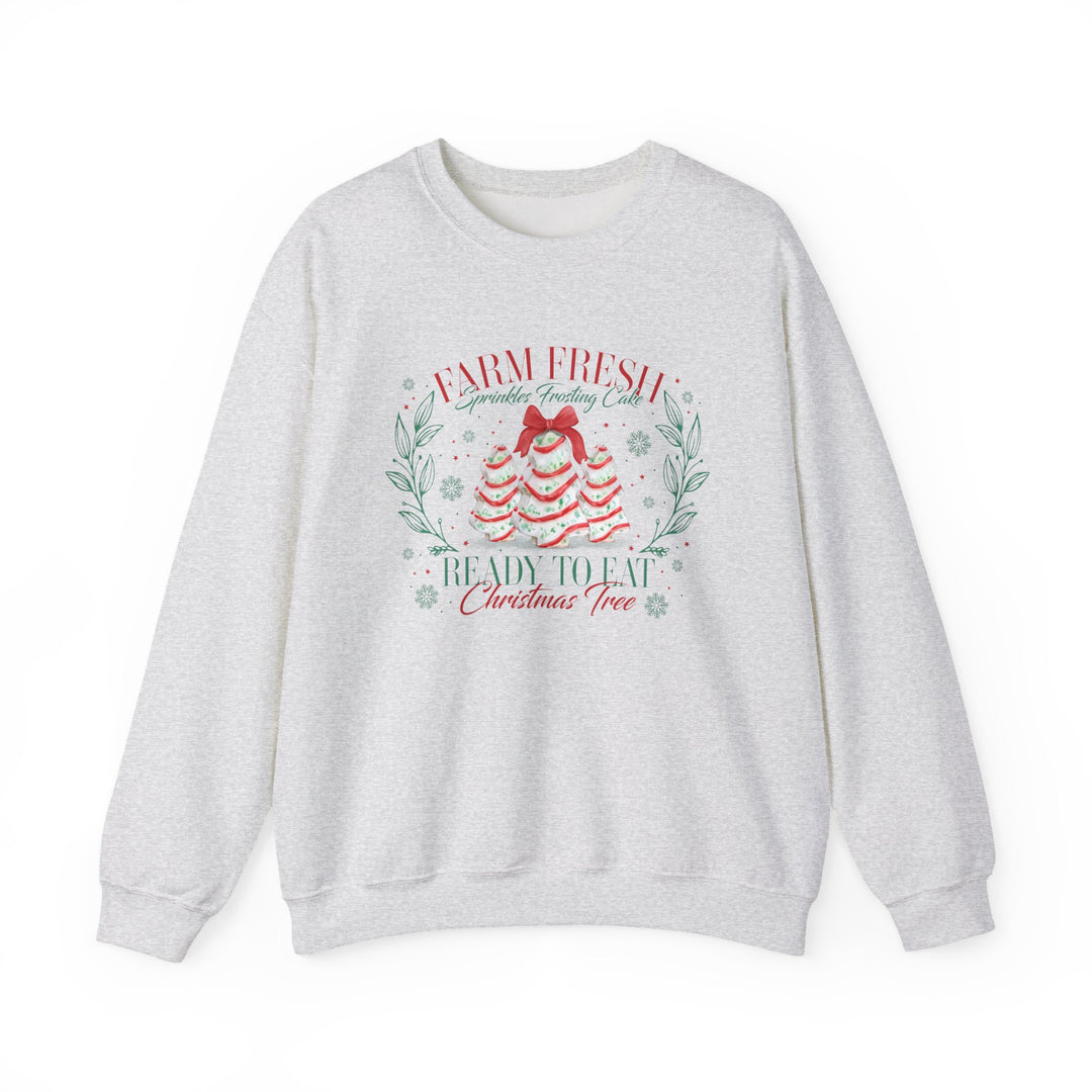 Light-heather gray sweatshirt featuring playful Christmas-themed frosting tree design, Farm Fresh Sprinkles Frosting Cake, perfect for cozy holiday wear from Faith Family Designs.