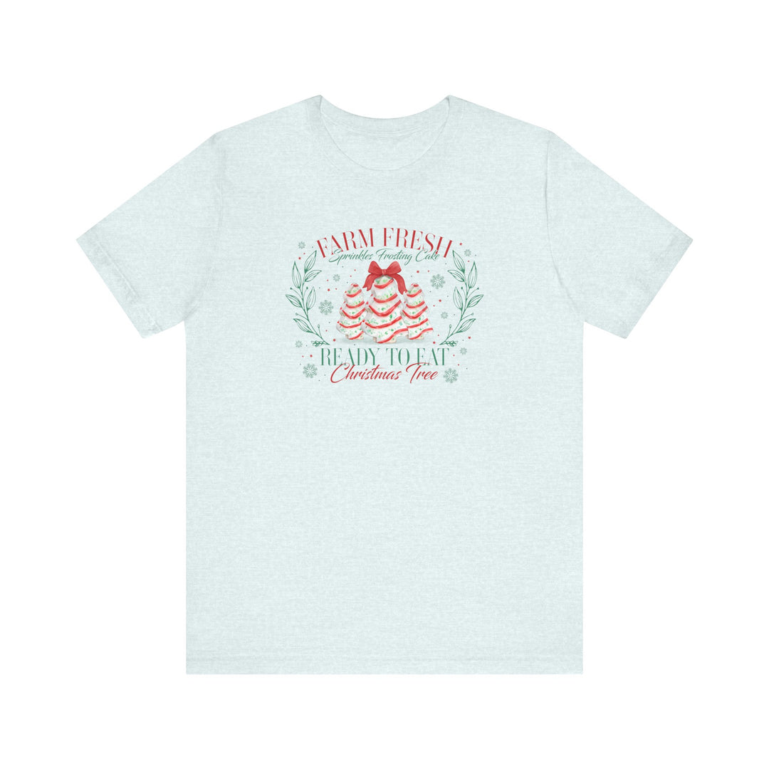 Unisex cotton tee with playful holiday design featuring cake-shaped Christmas trees and festive slogans, Farm Fresh Sprinkles Frosting Cake and Ready to Eat Christmas Tree.