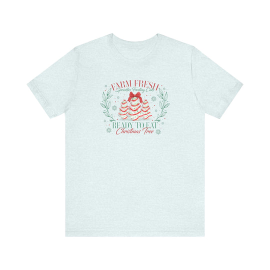Unisex cotton tee with playful holiday design featuring cake-shaped Christmas trees and festive slogans, Farm Fresh Sprinkles Frosting Cake and Ready to Eat Christmas Tree.