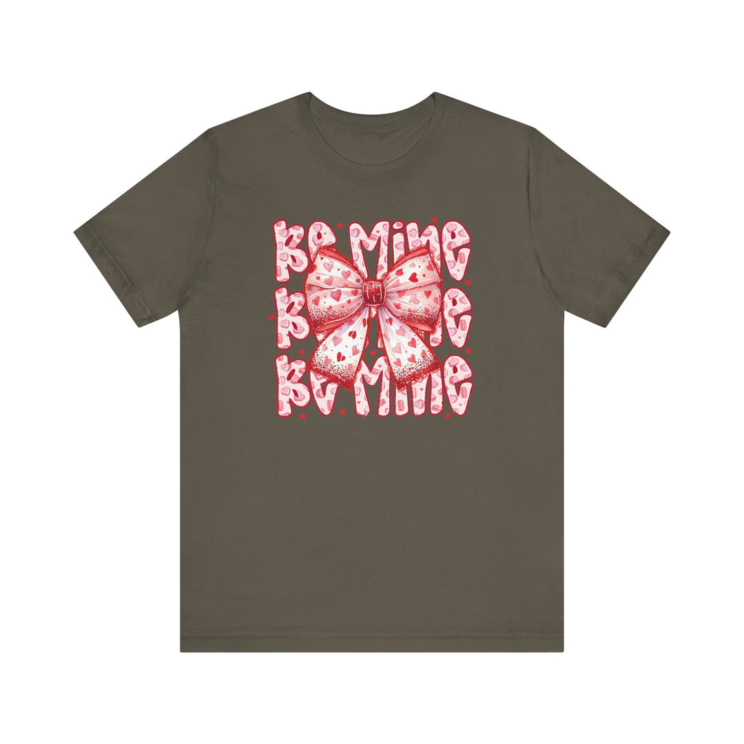 Be Mine Tee in olive-green features a stylized pink bow with heart patterns and BAMING text, exemplifying Faith Family Designs' unique graphic t-shirts.