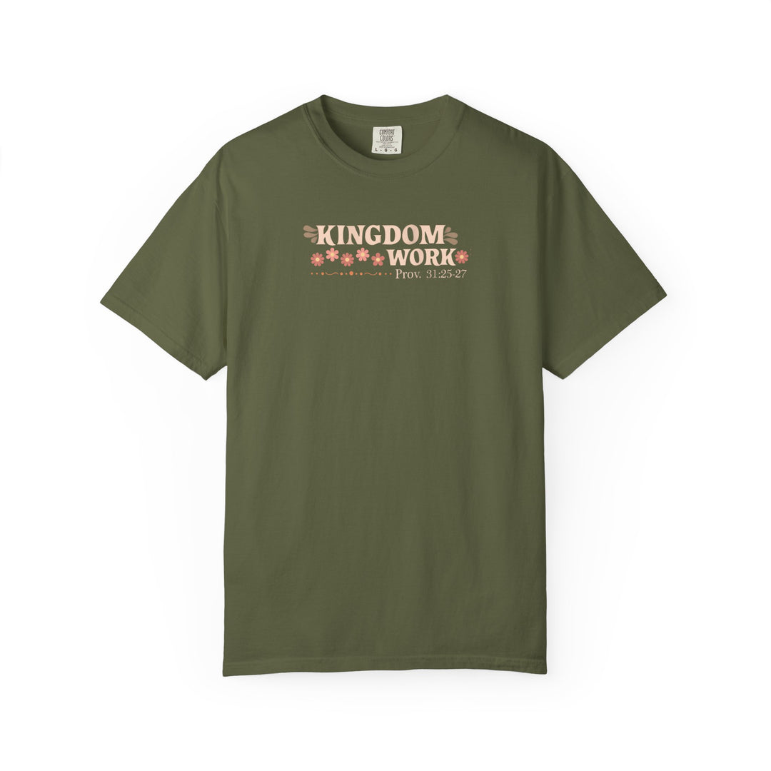 Olive-green “Kingdom Work” tee with floral accents, featuring Proverbs 31:25-27. Made from soft, durable cotton, offering a relaxed fit.