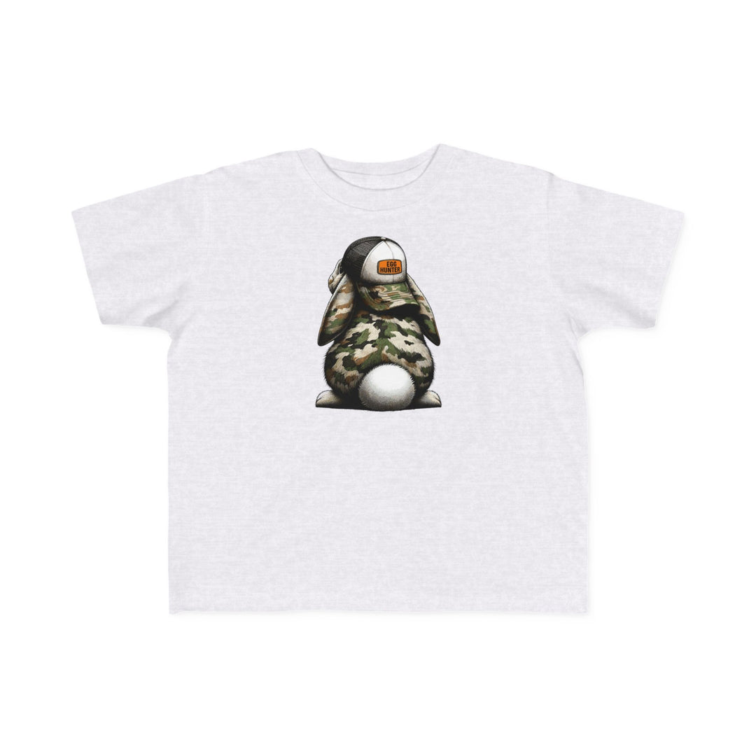 Egg Hunter Kids Tee featuring a cartoon rabbit wearing a hat, designed for toddlers. Made from soft, 100% combed cotton, ensuring comfort for sensitive skin.