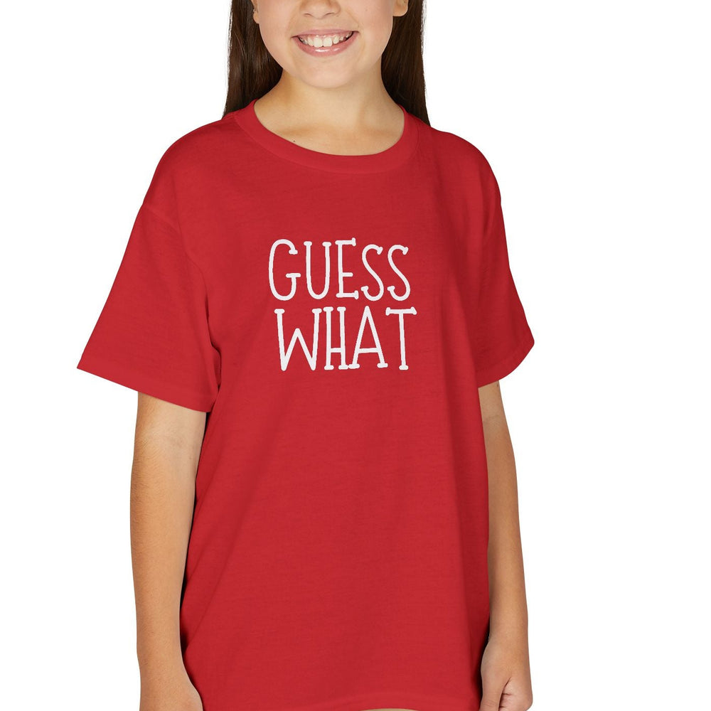Young girl wearing a GUESS WHAT red tee with tan cargo shorts, showcasing the Youth DryBlend® T-Shirt's modern fit and eco-friendly features.