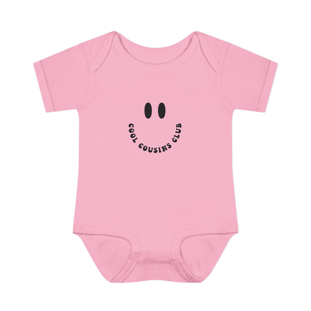Cool Cousins Club Onesie: Soft, ring-spun cotton bodysuit with lap shoulders for easy adjustment, designed for infants' comfort and movement, unisex fit, tear-away label.