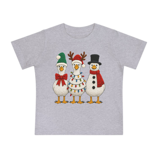Christmas Geese Baby Tee featuring festive geese in holiday attire, perfect for baby's first steps. Made from soft, durable cotton for comfort and style.